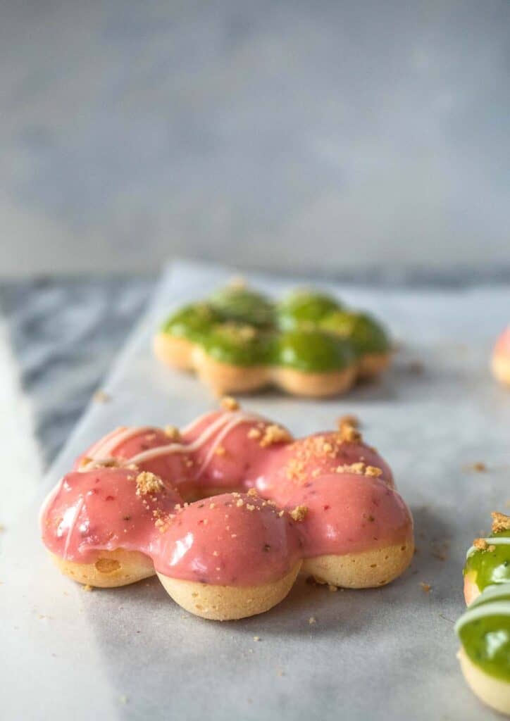 Strawberry and Matcha Baked Mochi Donuts with white chocolate glaze