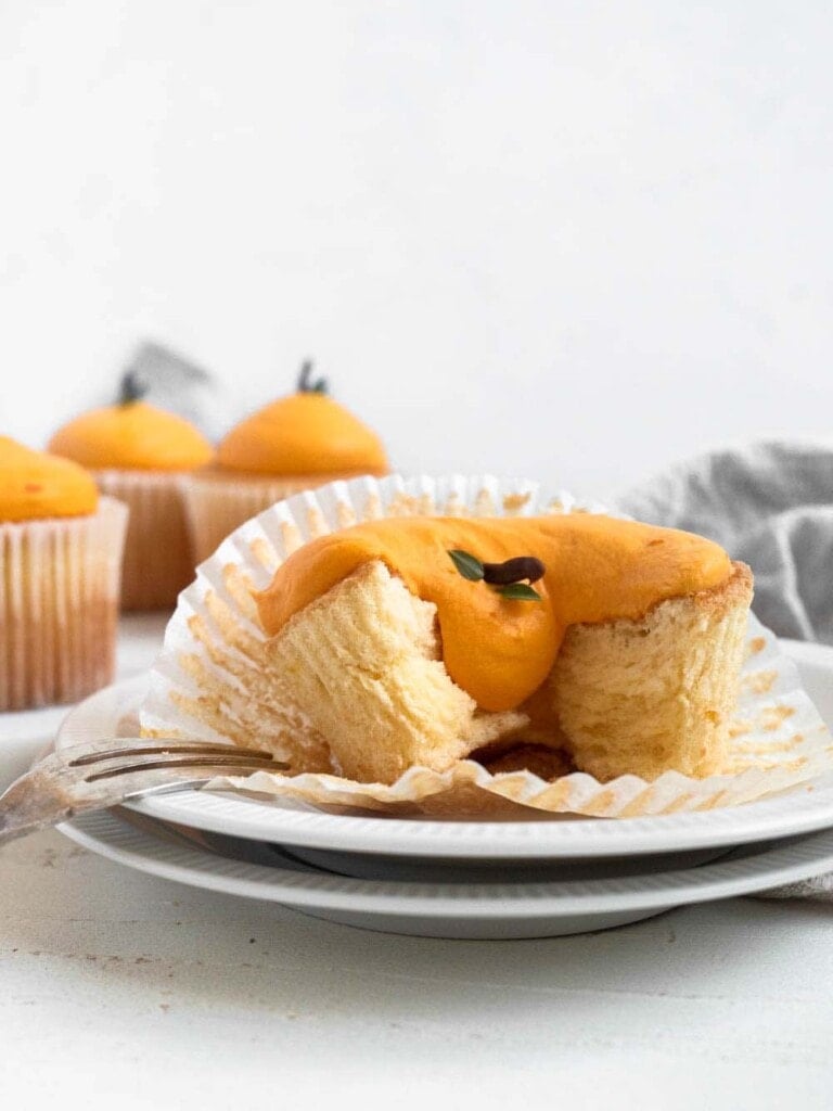 Mandarin shaped cotton-soft chiffon cupcakes with citrus whipped cream 