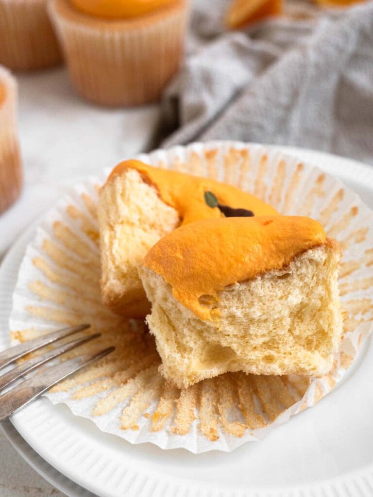 Mandarin shaped cotton-soft chiffon cupcakes with citrus whipped cream 