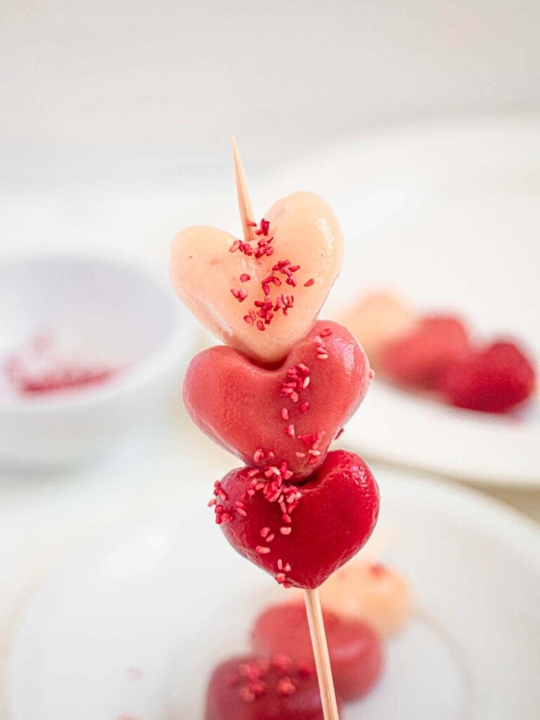 Heart shaped raspberry and strawberry Hanami dango mochi