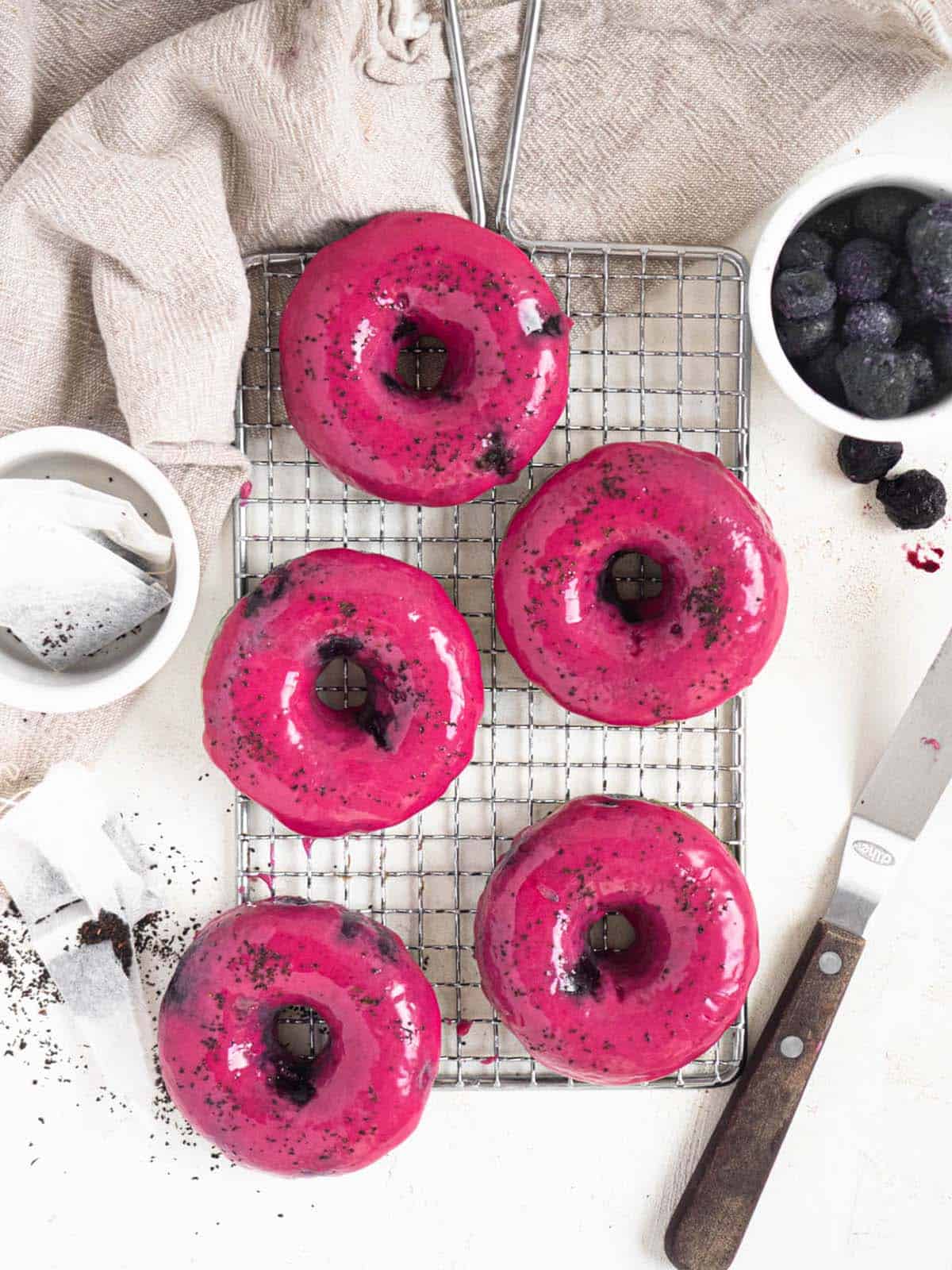 Soft cake donuts topped with a tangy lemon and blueberry glaze