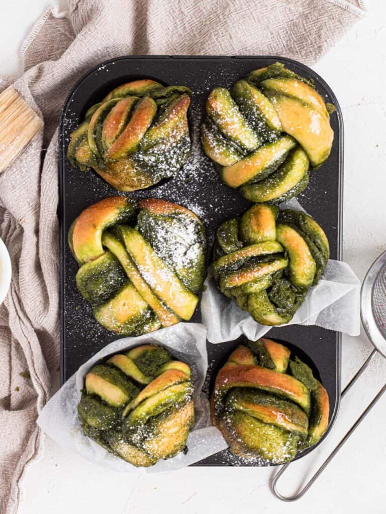Buttery soft and fluffy matcha bread buns knots with matcha spread 