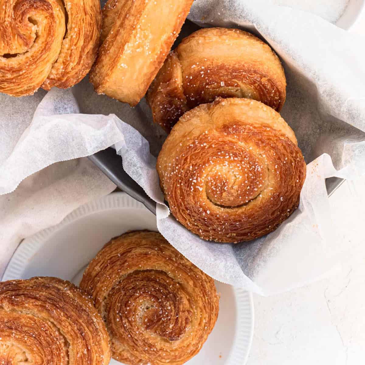 Kouign-amann are an indulgent crisp and flaky pastry made from layers of caramelised laminated dough