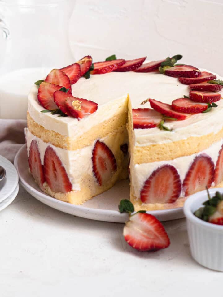 Frasier cake with strawberries, pastry cream and whipped cream in a soft and fluffy sponge cake