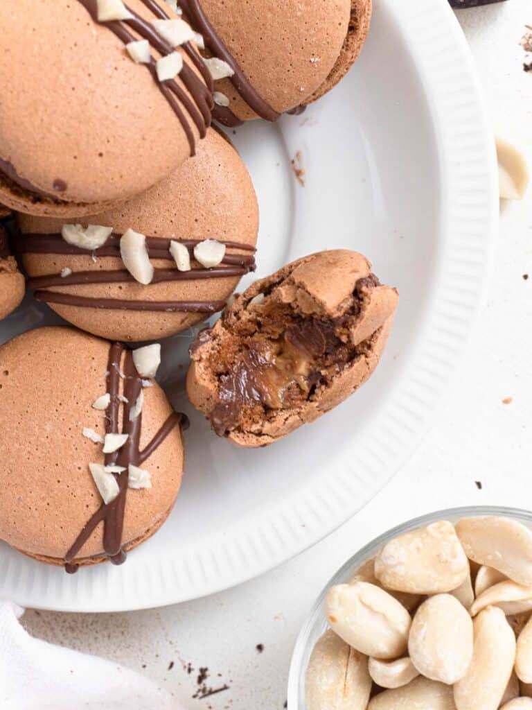 Macarons filled with silky chocolate buttercream and crunchy peanut butter 