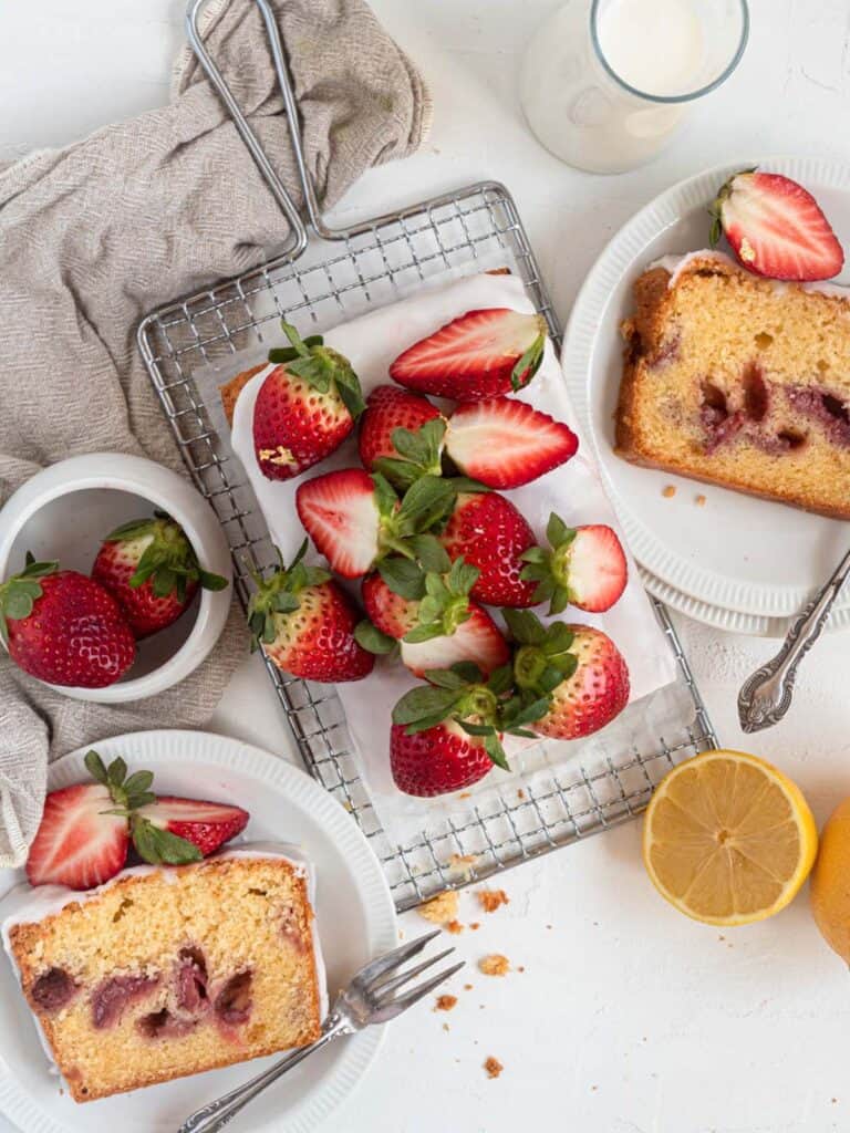 Moist strawberry pound cake with lemon glaze and fresh strawberries