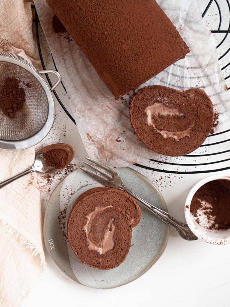 Chocolate Swiss roll cake filled with light chocolate whipped cream