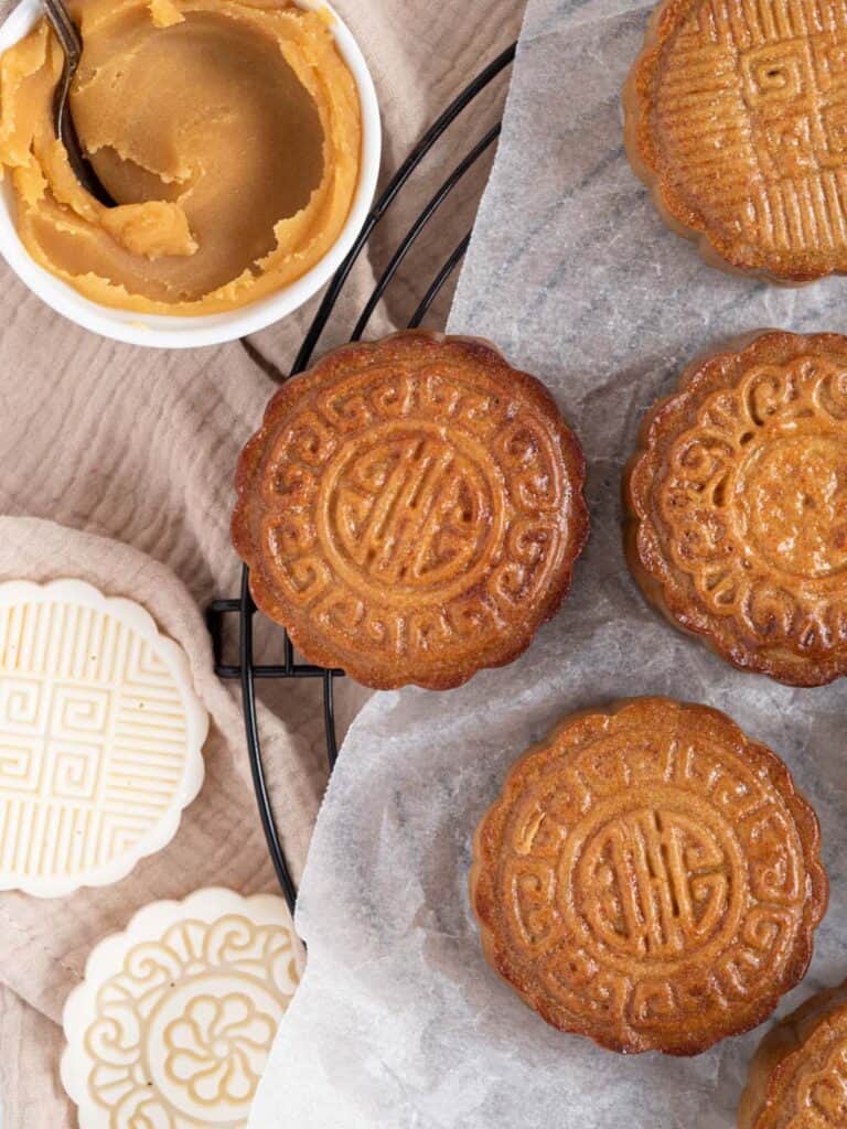 Traditional cantonese style baked mooncakes with chestnut and red bean paste and double salted duck yolks