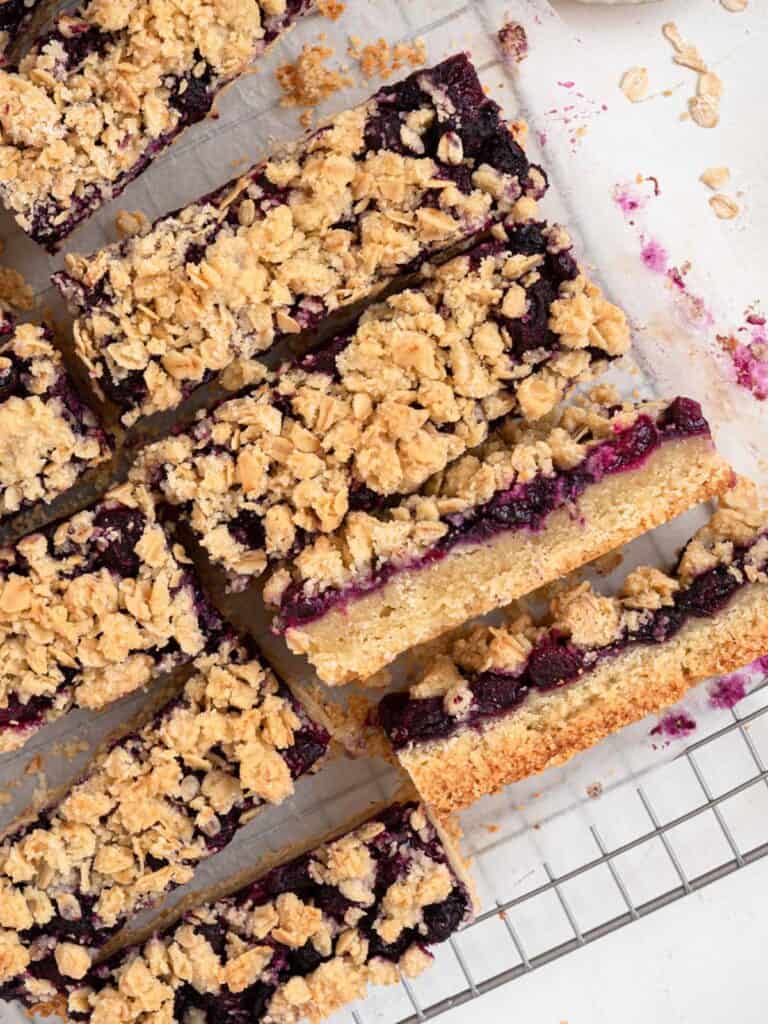 Buttery almond shortbread with blueberry jam and oat crumble