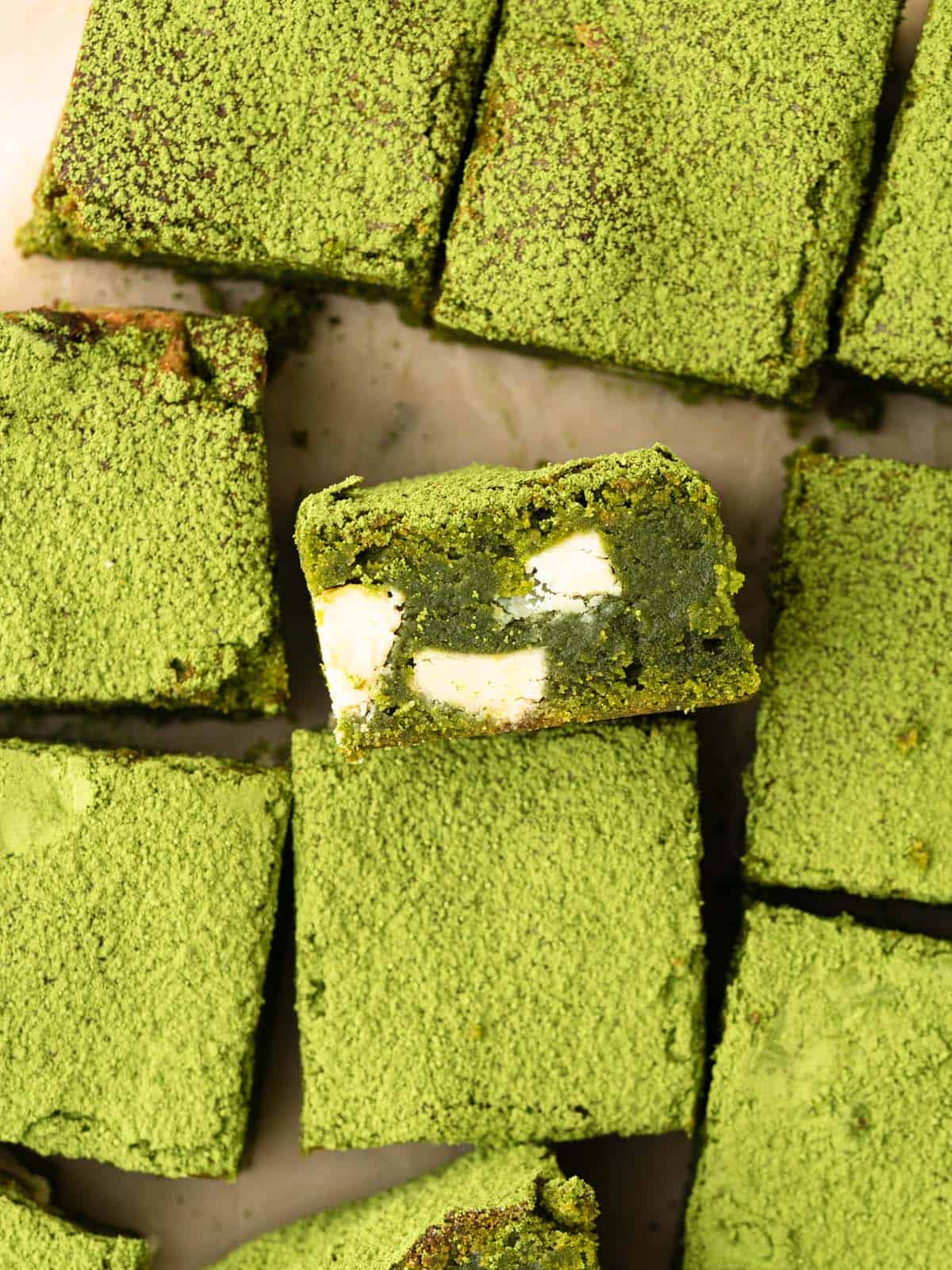 matcha brownies with white chocolate dusted with green tea powder