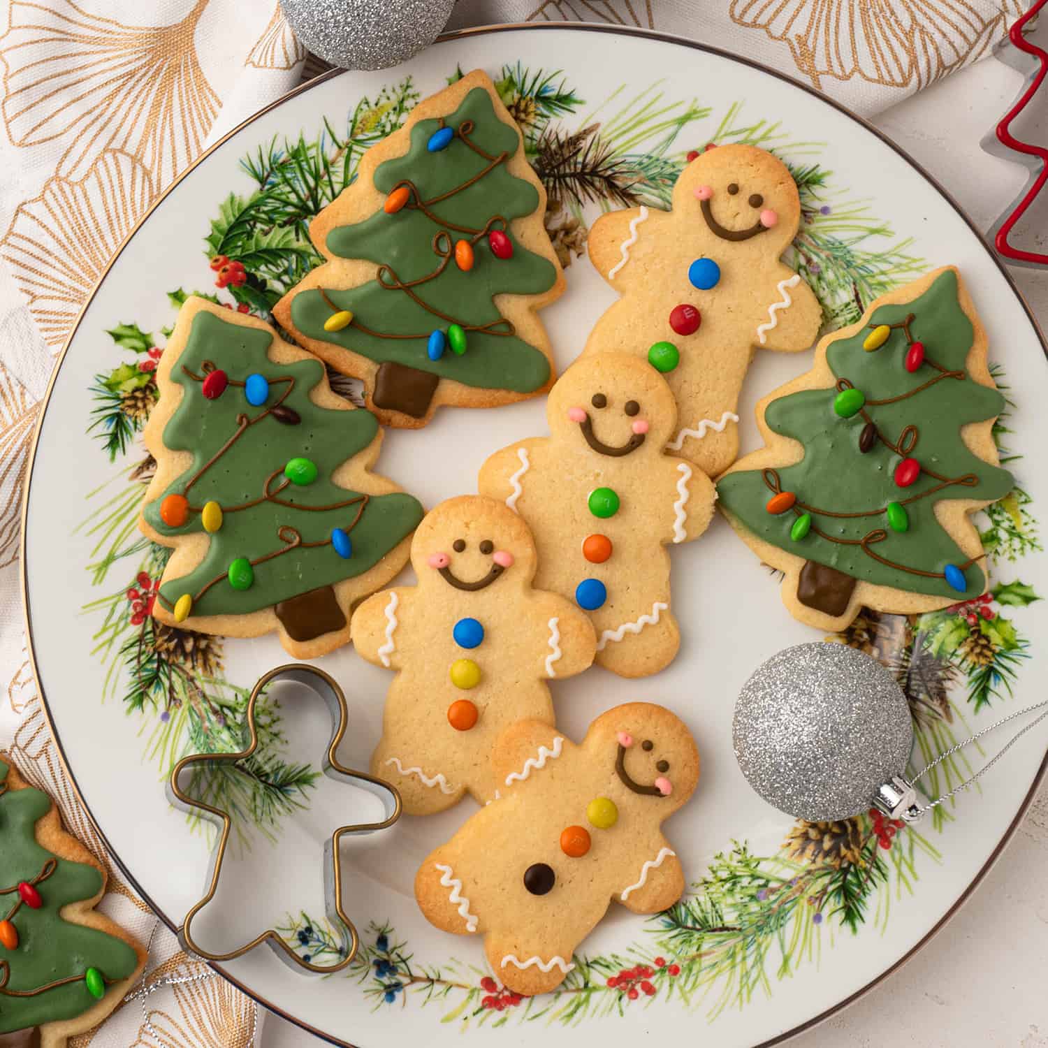 christmas tree and gingerbread men sugar cookies iced with royal icing