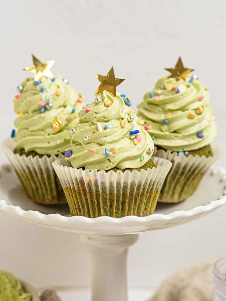 Christmas tree shaped matcha green tea cupcakes with whipped white chocolate ganache frosting