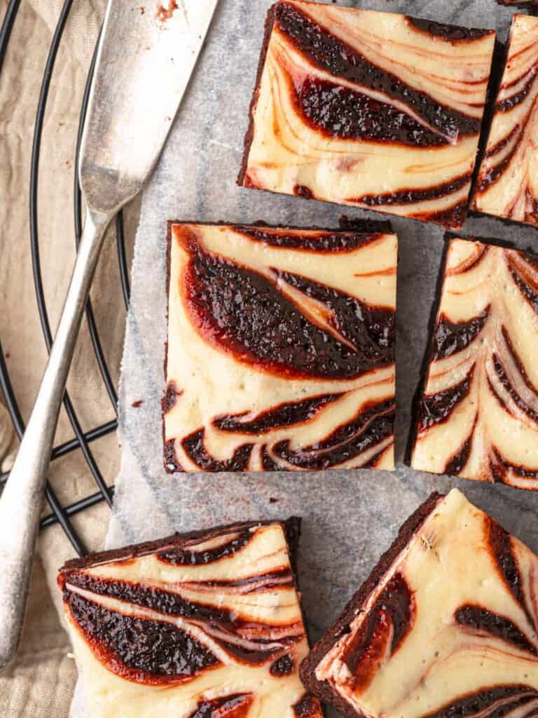 Fudgy red velvet brownies with a vanilla cheesecake swirl 