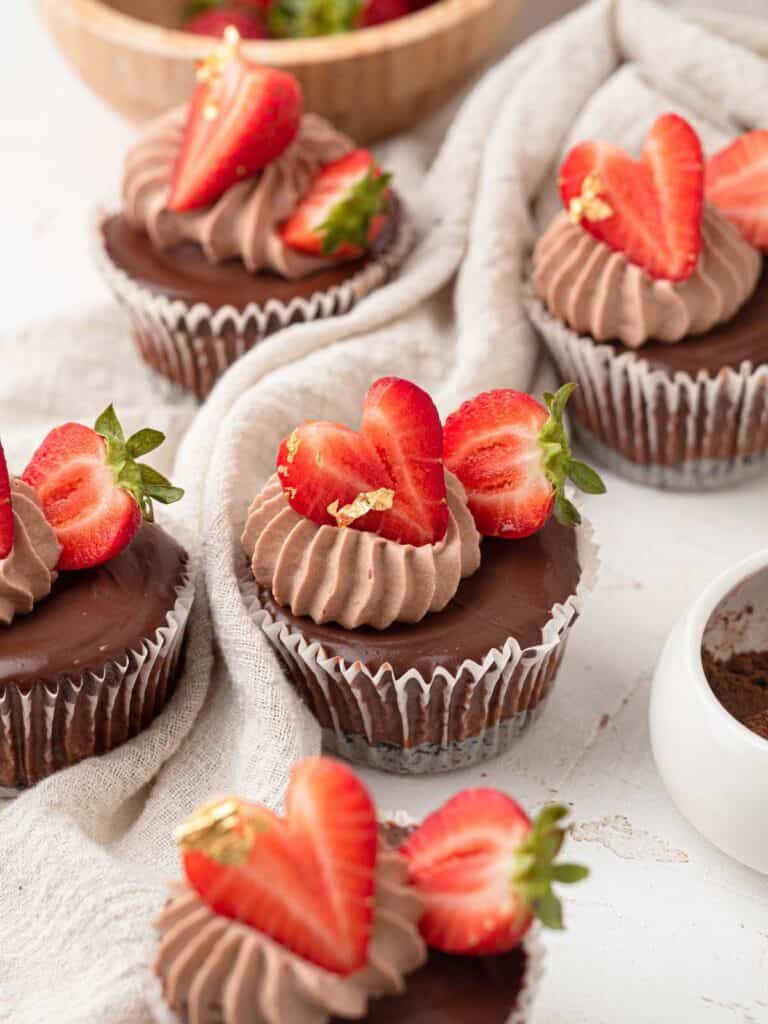 Chocolate cheesecake with strawberries, dark chocolate ganache, cocoa whipped cream and an Oreo base