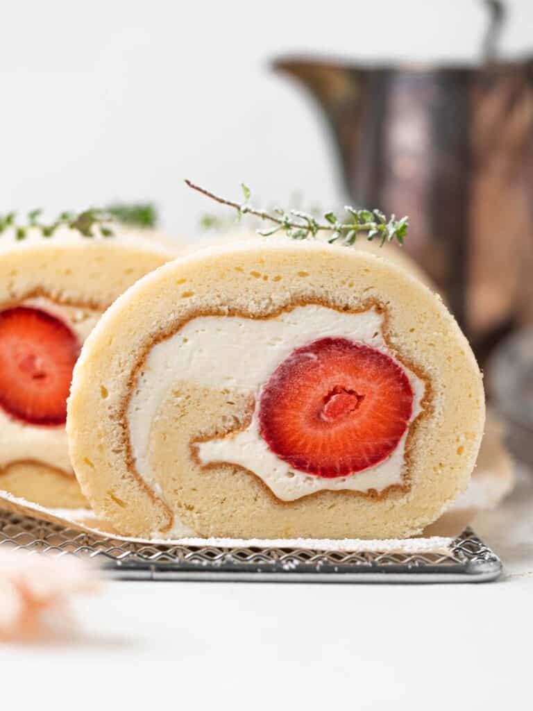 Japanese style strawberry Swiss roll cake with vanilla whipped cream