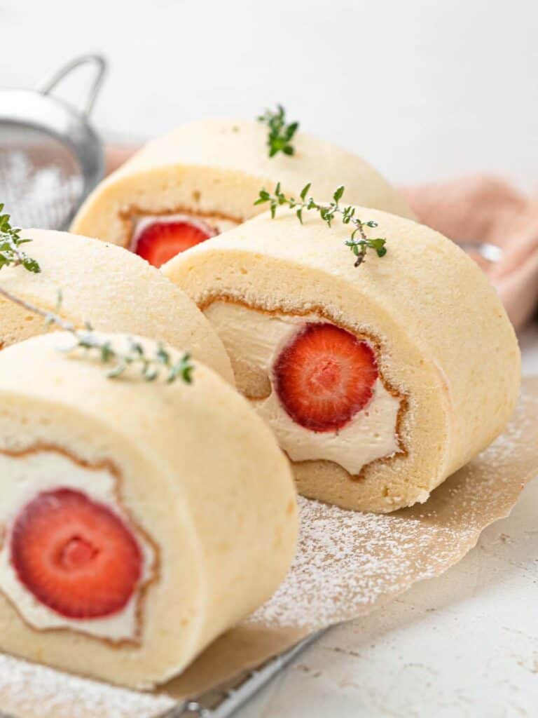 Japanese style strawberry Swiss roll cake with vanilla whipped cream 