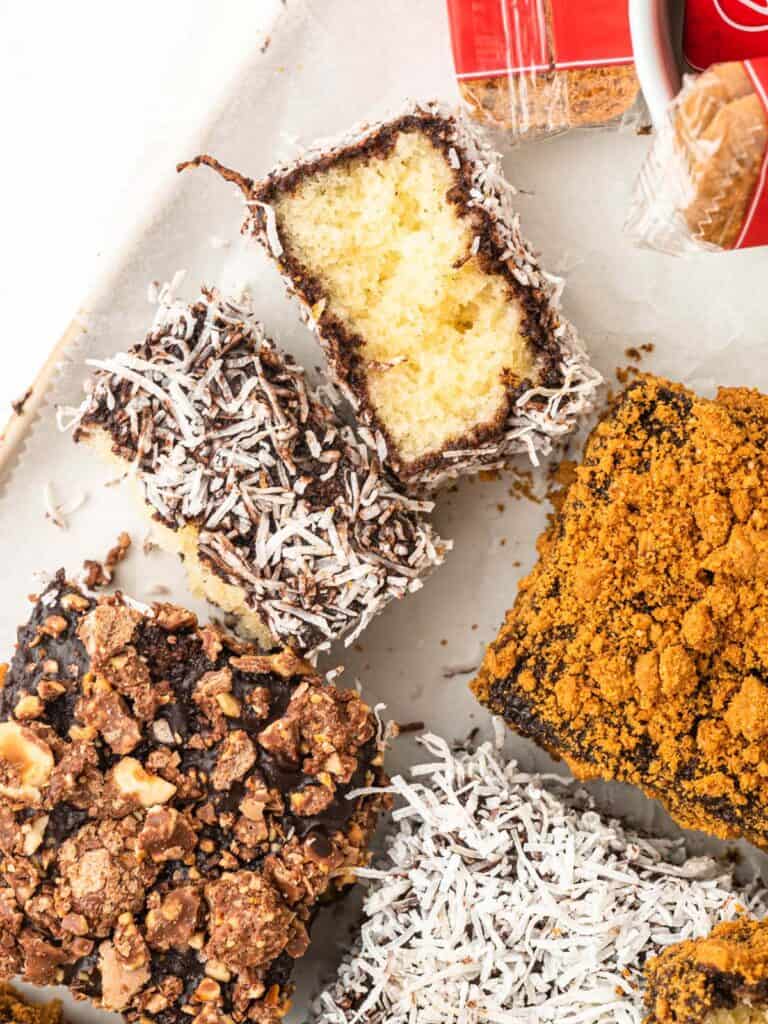 Australian lamingtons rolled in chocolate glaze and coconut, biscoff and Ferrero rochers