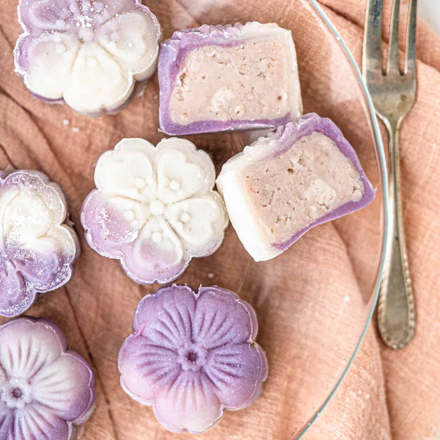 Flower shaped taro snow skin mooncakes with a taro coconut filling