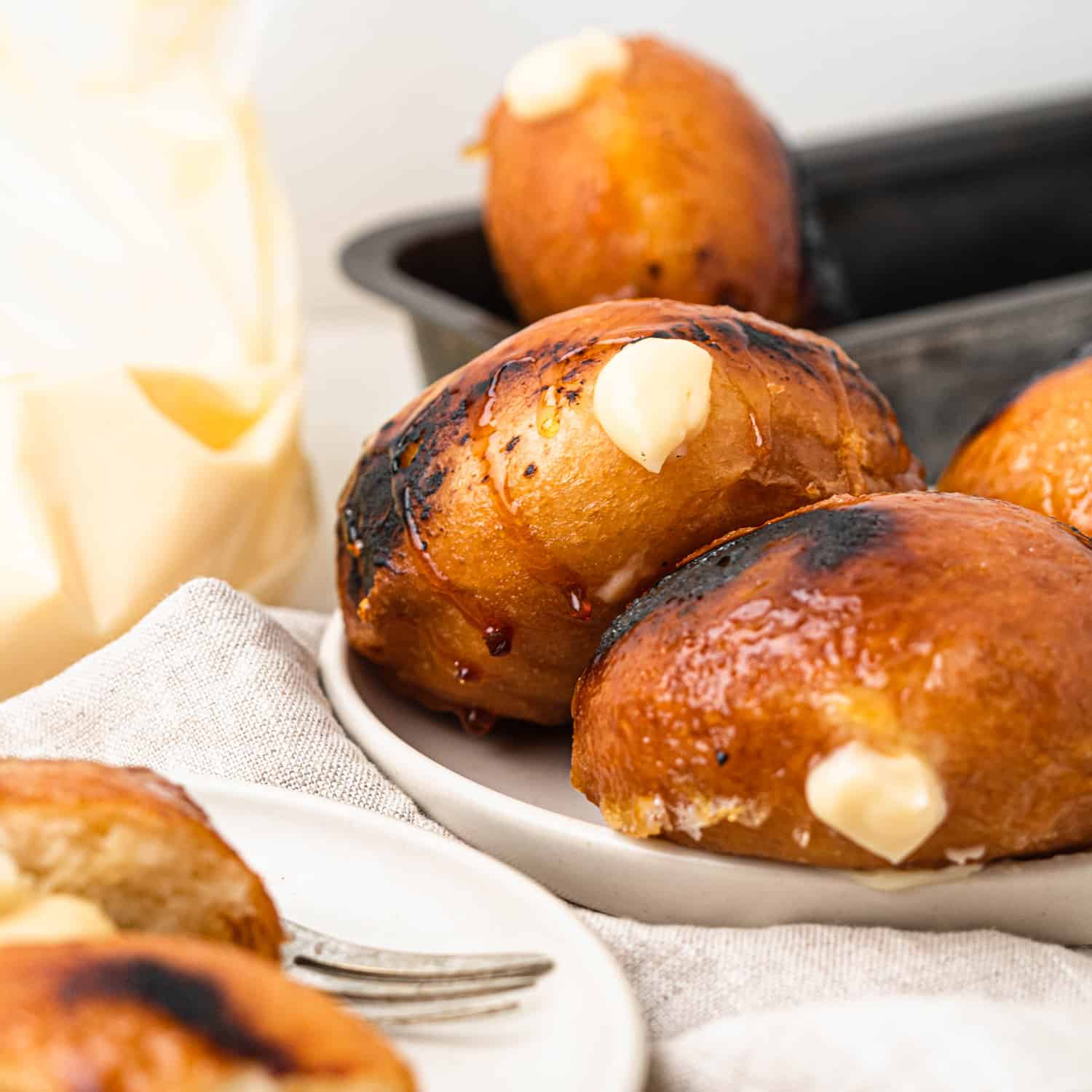 Yeast raised donuts filled with creamy vanilla custard and coated in a caramelised sugar coating