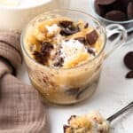 3 minute microwave Chocolate chip mug cake topped with whipped cream