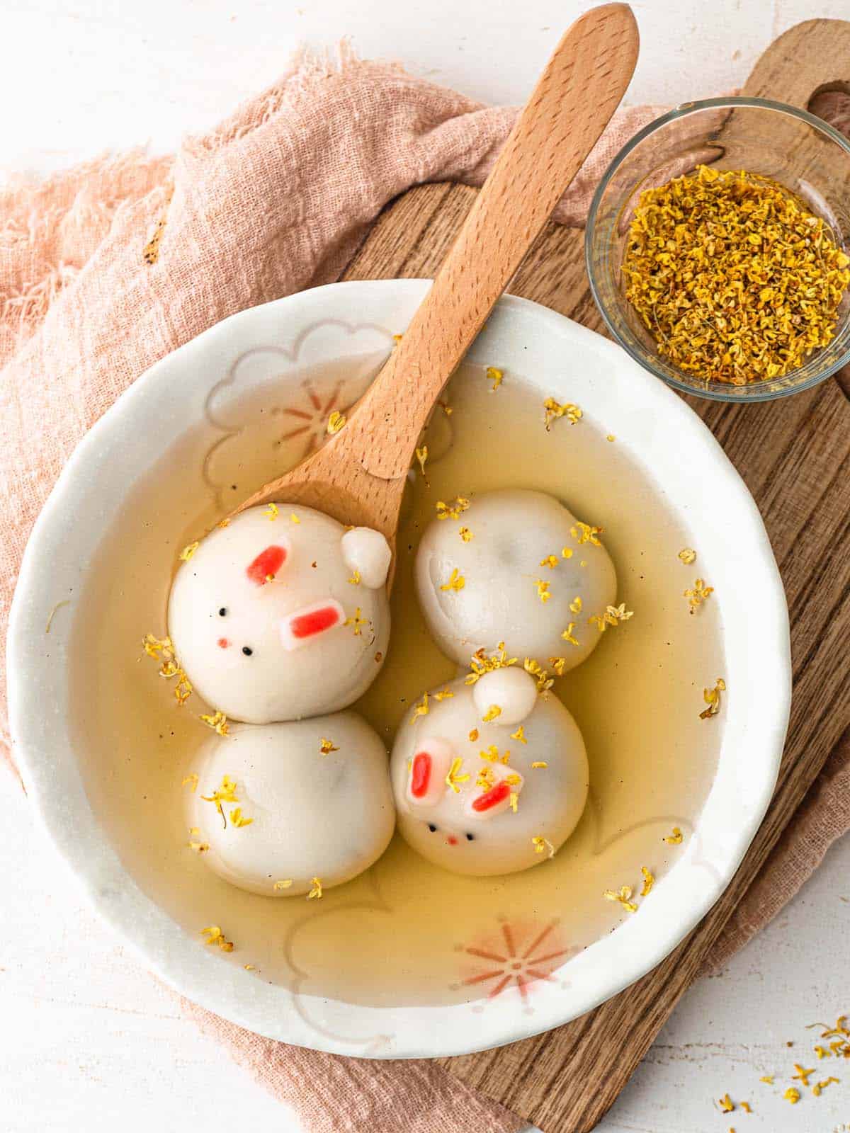 bunny shaped tang yuan filled with black sesame in ginger soup