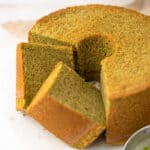 Matcha green tea chiffon sponge cake with whipped cream and strawberries