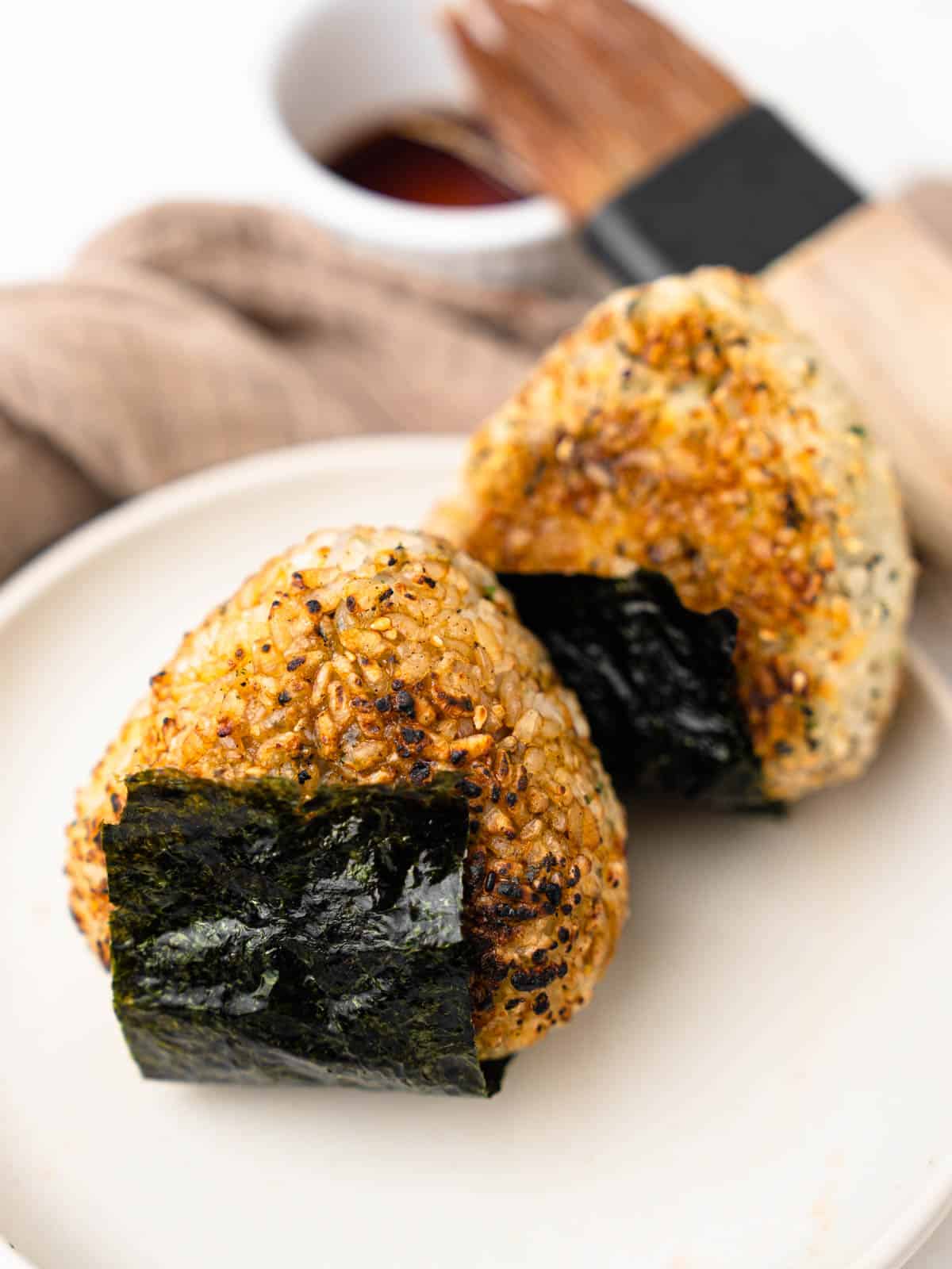 grilled yaki onigiri with seaweed brushed with soy sauce