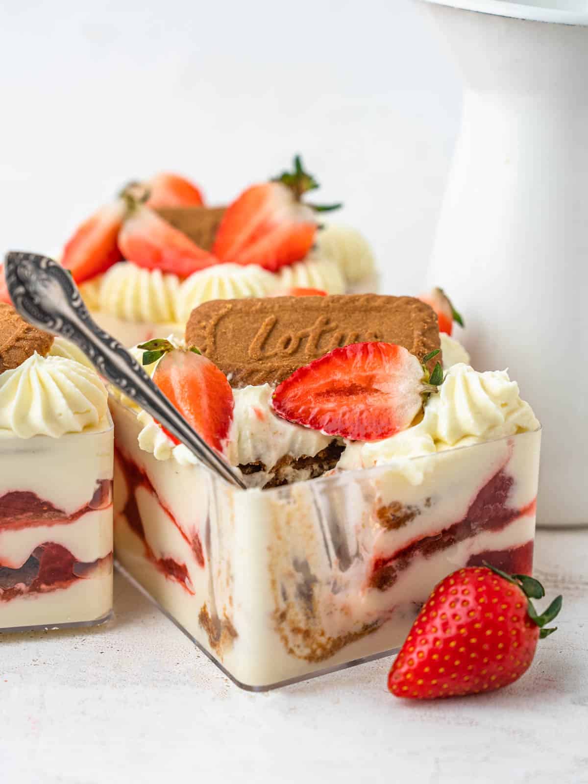 strawberry ice box cake with strawberry jam, whipped cream and graham crackers
