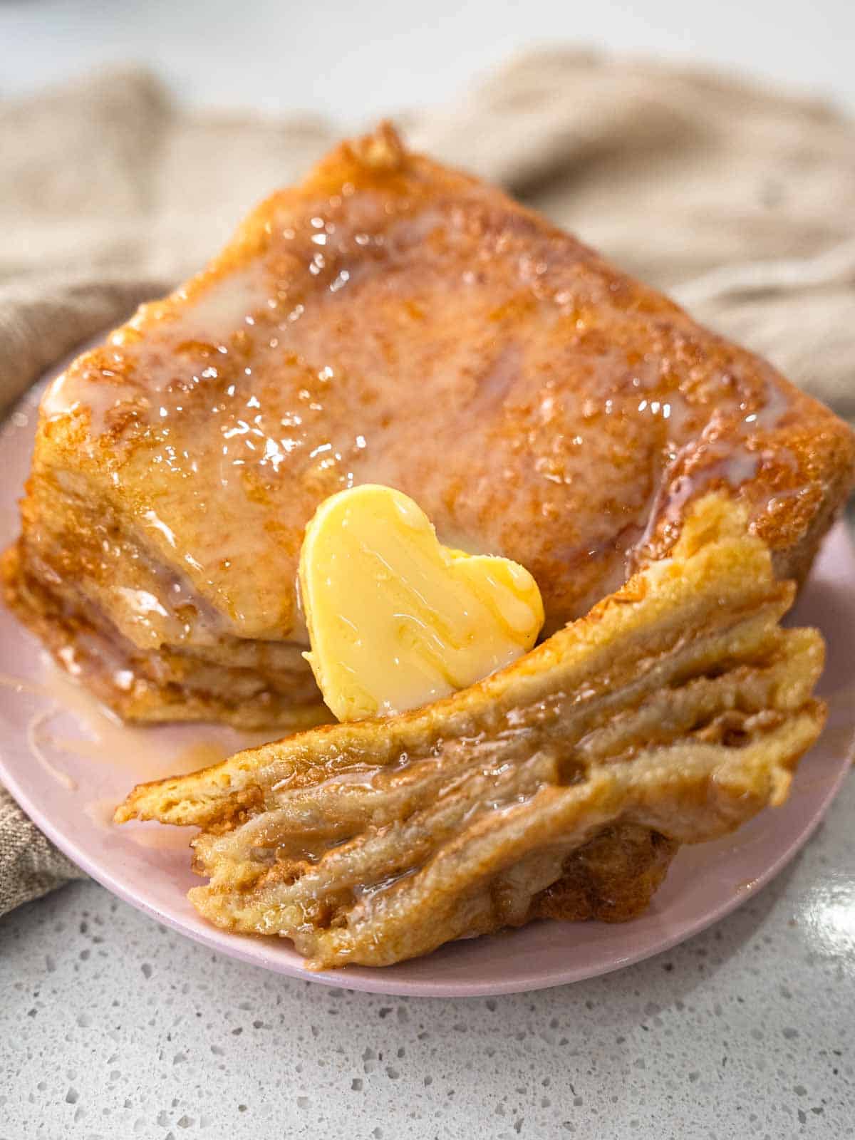 Hong kong french toast served with condensed milk and butter