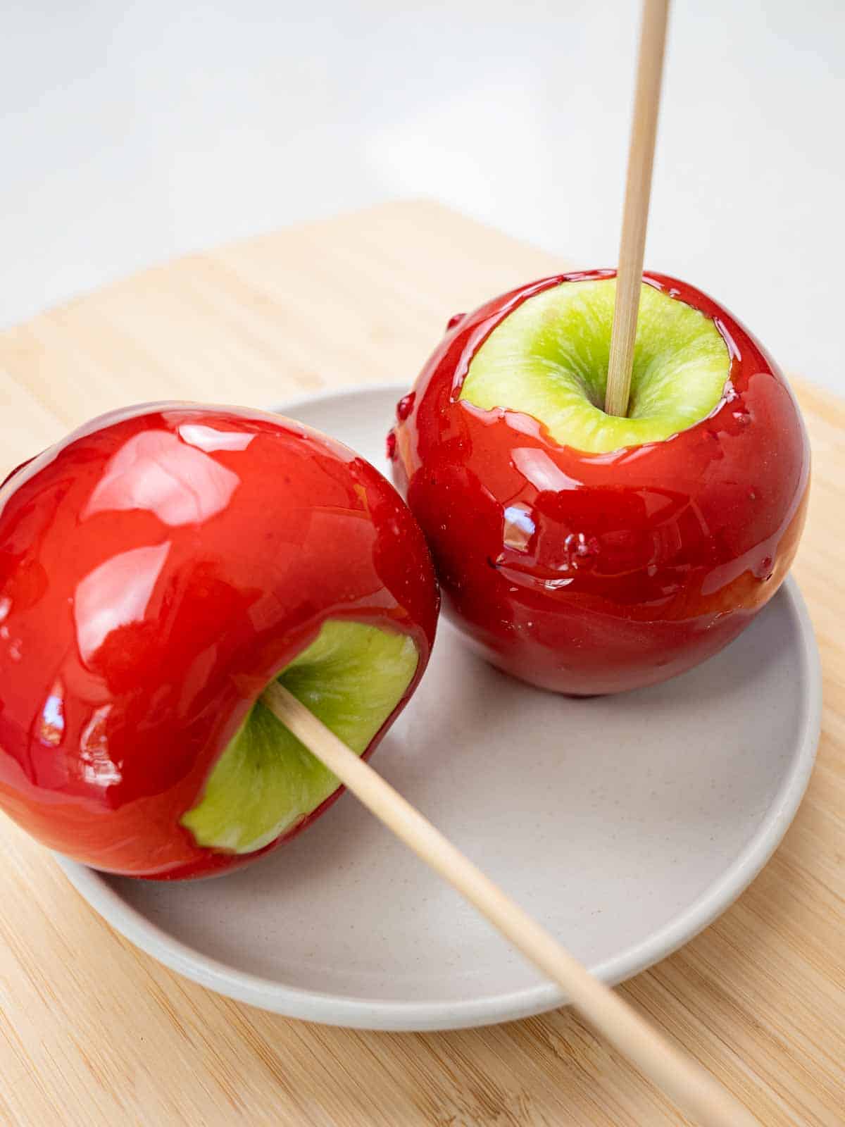 granny smith apples coated in a candy glaze