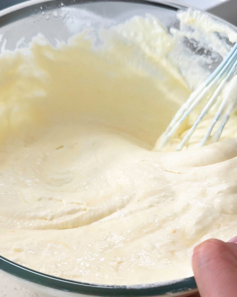 Folding whipped cream into mascarpone - Catherine Zhang Folding whipped cream into mascarpone