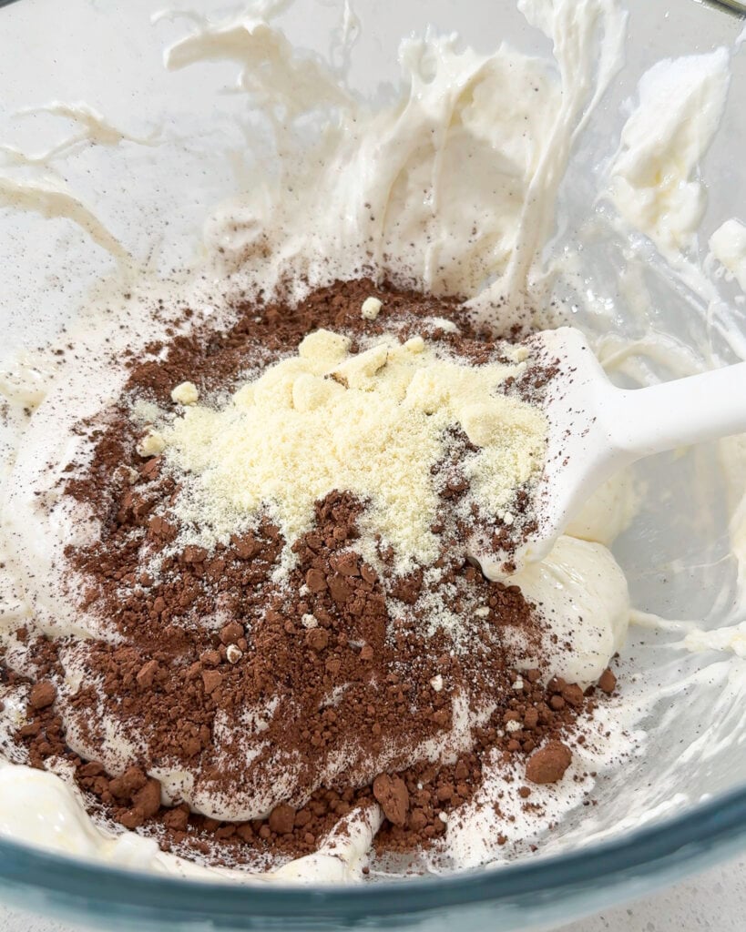 Powders are being added to a melted mixture - Catherine Zhang Powders are being added to a melted mixture