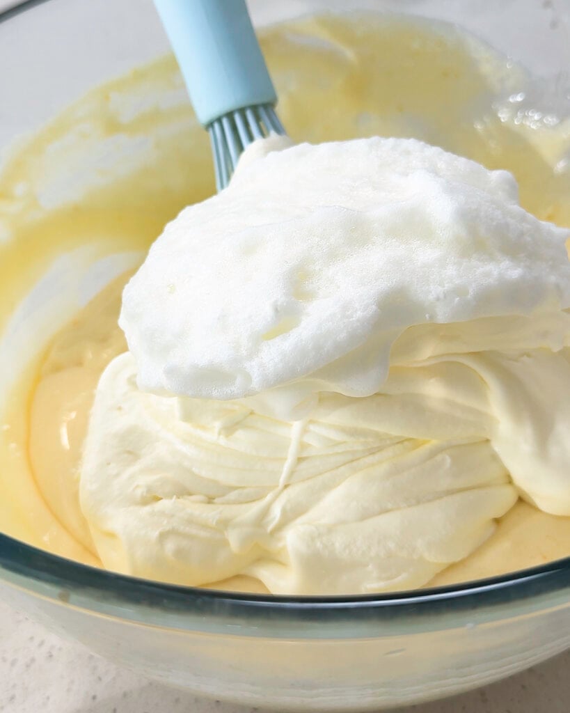 Whipped foam is visibly placed on top of the creamy mixture - Catherine Zhang Whipped foam is visibly placed on top of the creamy mixture