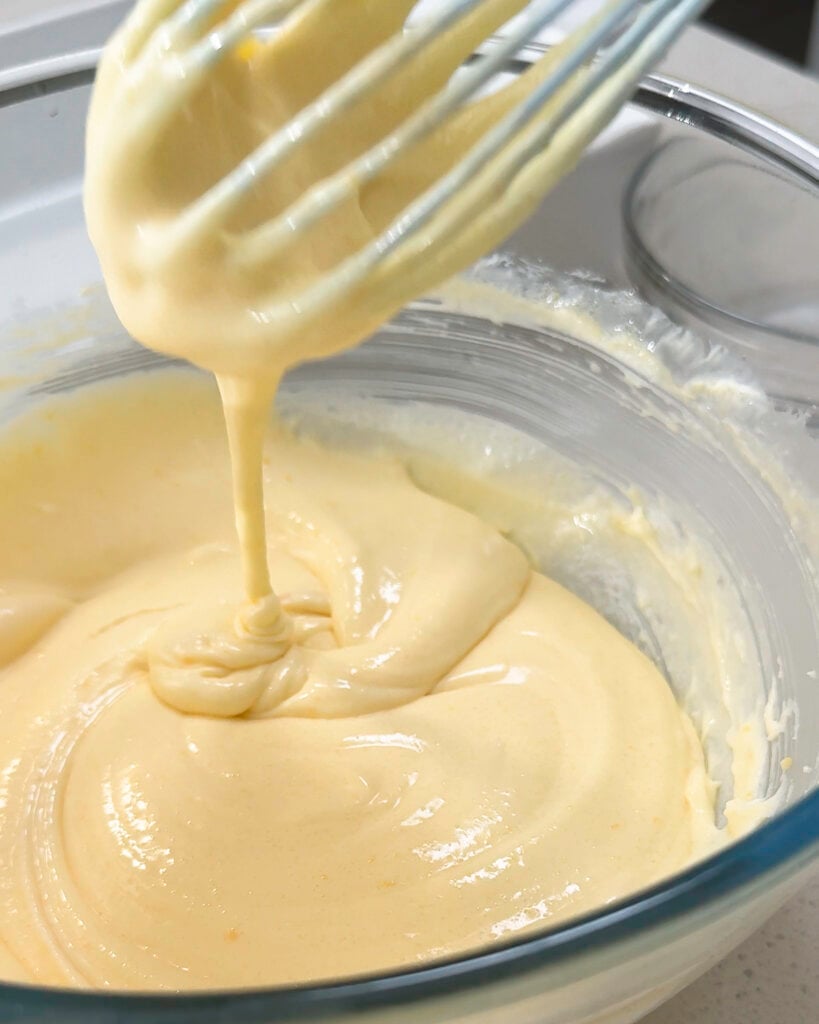 Whisking egg yolk mixture until thick - Catherine Zhang Whisking egg yolk mixture until thick
