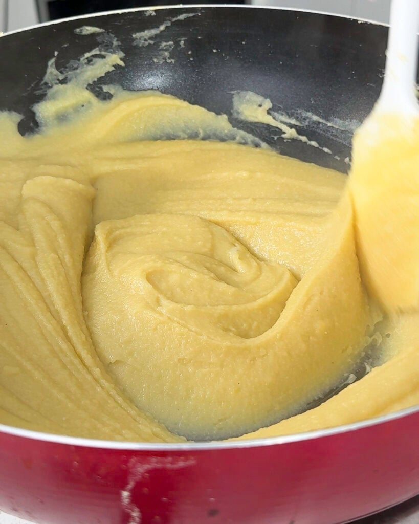 Cooking mung bean paste in pan until thick - Catherine Zhang Cooking mung bean paste in pan until thick