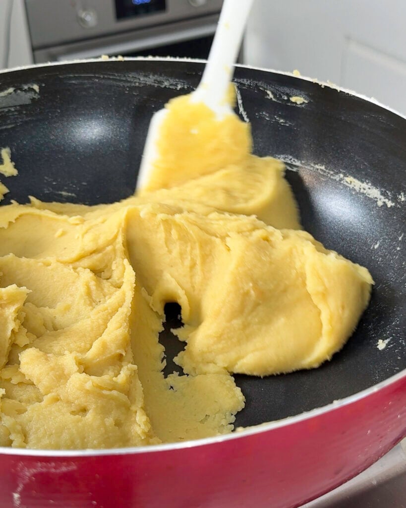 Thick mung bean dough forming in pan - Catherine Zhang Thick mung bean dough forming in pan