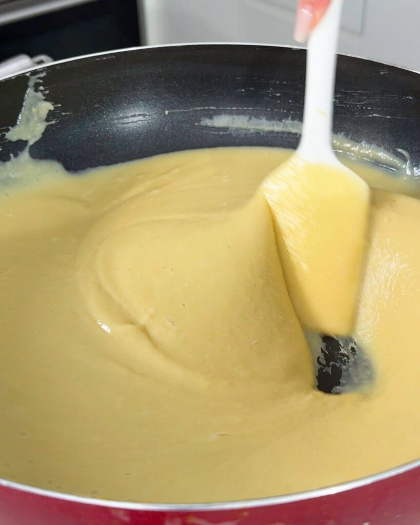 Smooth blended mung bean paste being stirred - Catherine Zhang Smooth blended mung bean paste being stirred