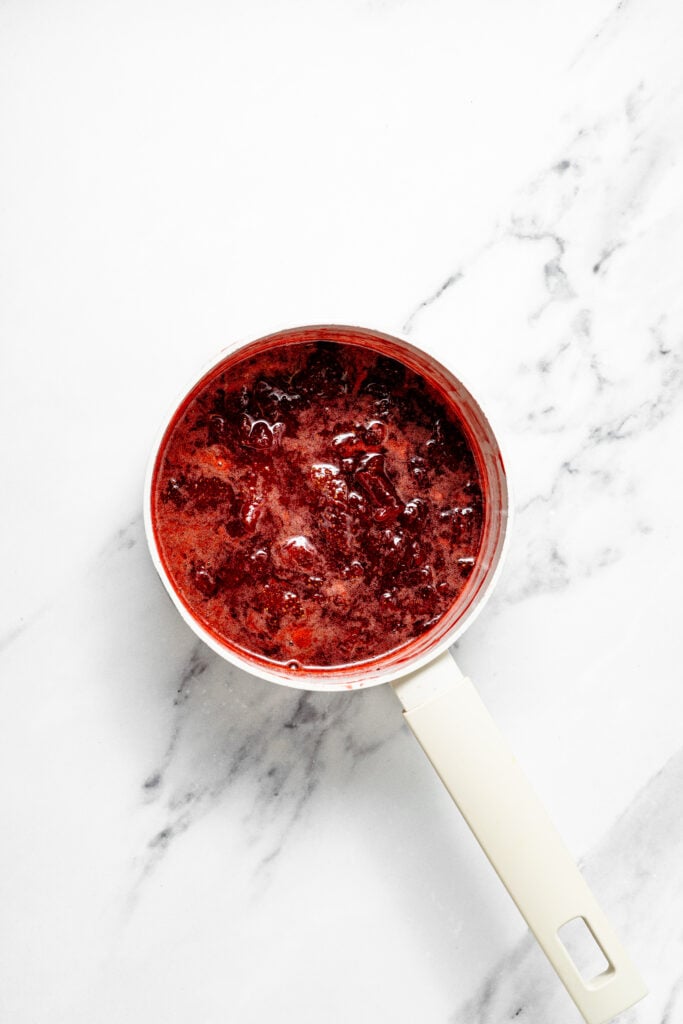 dark red strawberry mixture in a saucepan viewed from above - Catherine Zhang dark red strawberry mixture in a saucepan viewed from above
