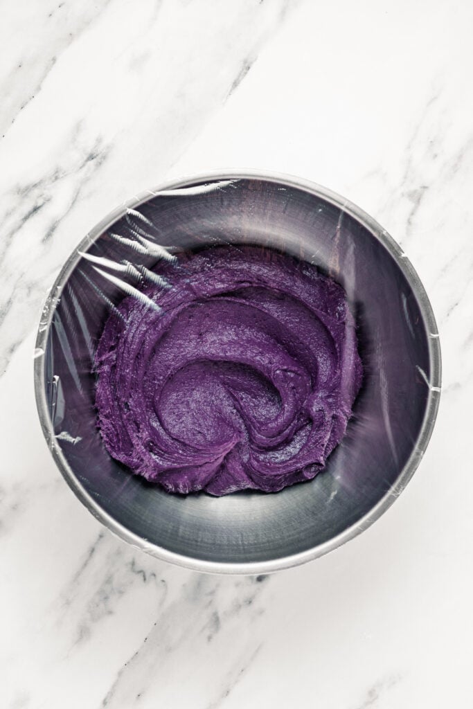 Covered bowl of dark purple dough mixture - Catherine Zhang Covered bowl of dark purple dough mixture