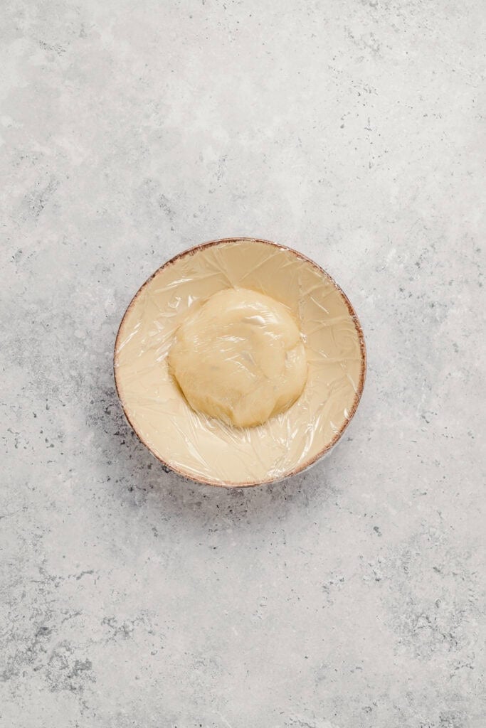 Covered water roux in a small bowl for Melon Pan dough preparation