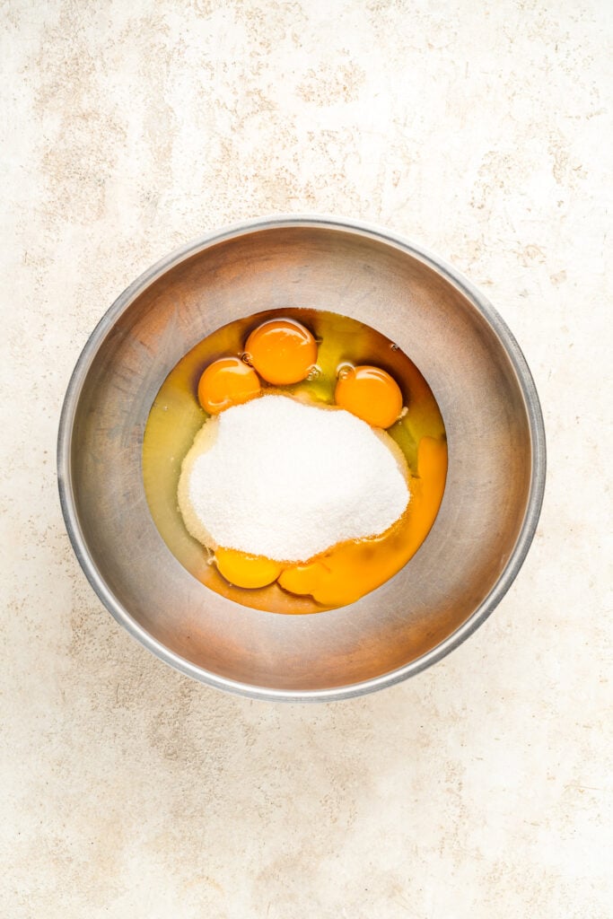 Eggs and sugar in a metal bowl - Catherine Zhang Eggs and sugar in a metal bowl