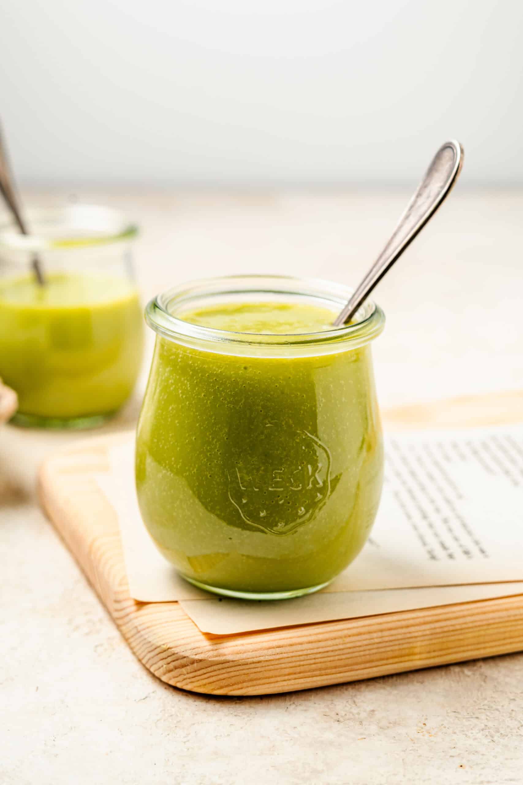 Finished Pandan Kaya Jam in a glass jar with a spoon - Catherine Zhang Finished Pandan Kaya Jam in a glass jar with a spoon