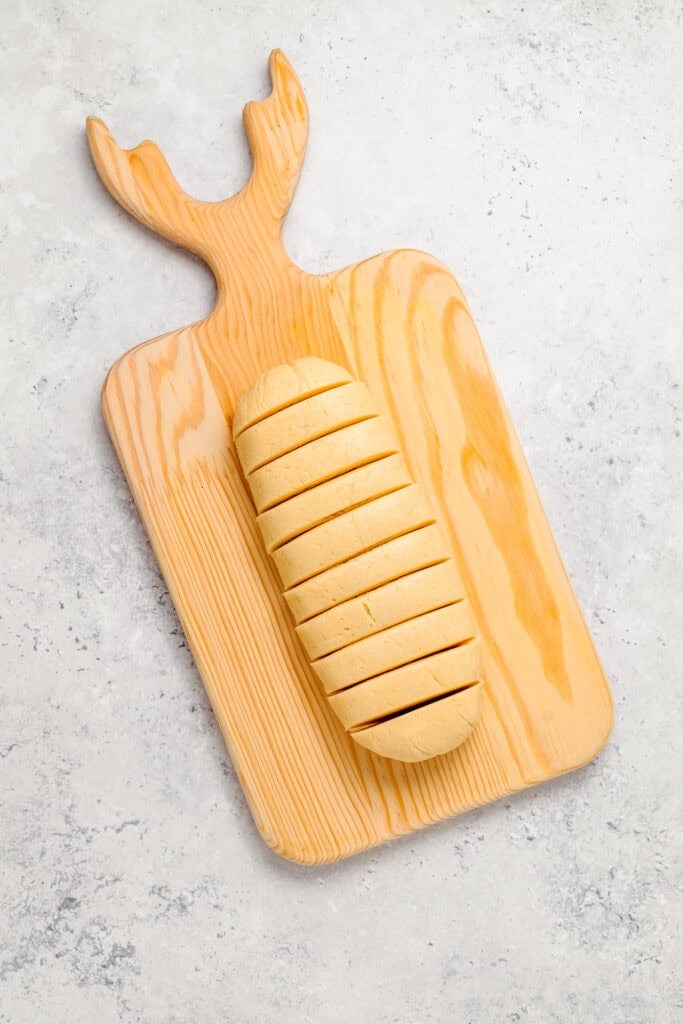 Sliced yellow cookie dough portions for Melon Pan topping