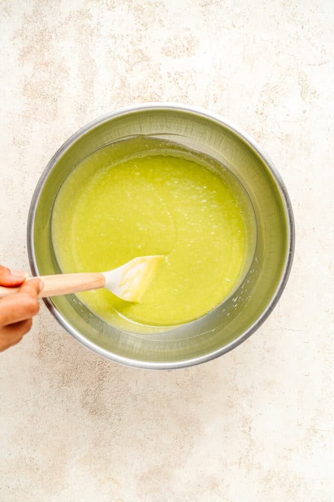 Smooth green mixture in a metal bowl - Catherine Zhang Smooth green mixture in a metal bowl