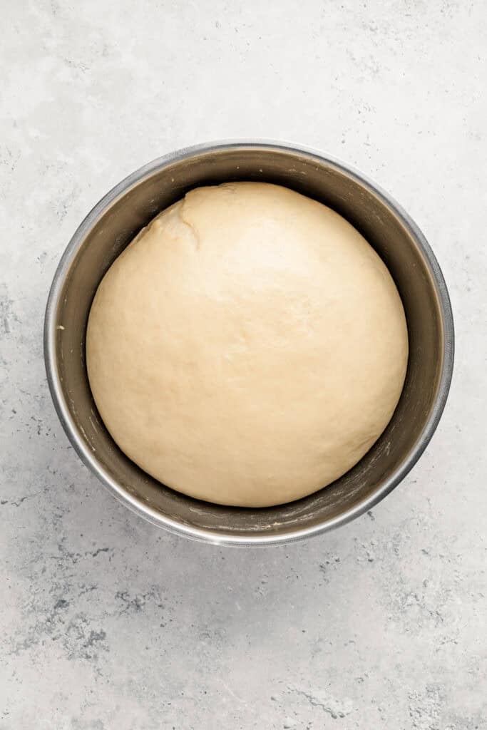 Smooth proofed Melon Pan dough before dividing into portions