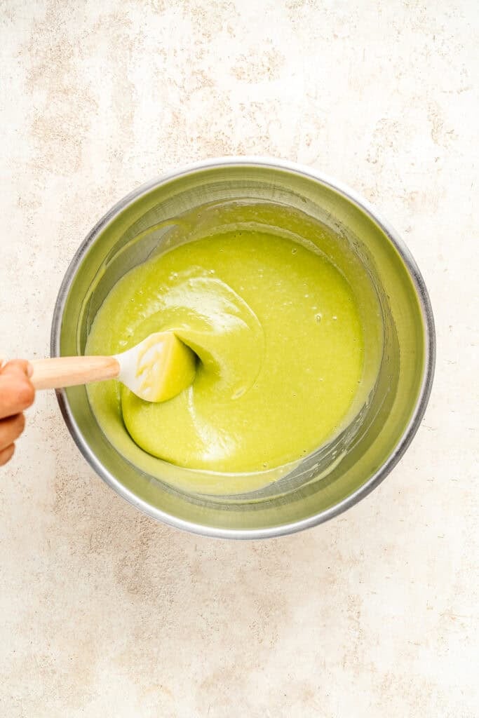 Thick green Pandan Kaya Jam mixture stirred with a spatula - Catherine Zhang Thick green Pandan Kaya Jam mixture stirred with a spatula
