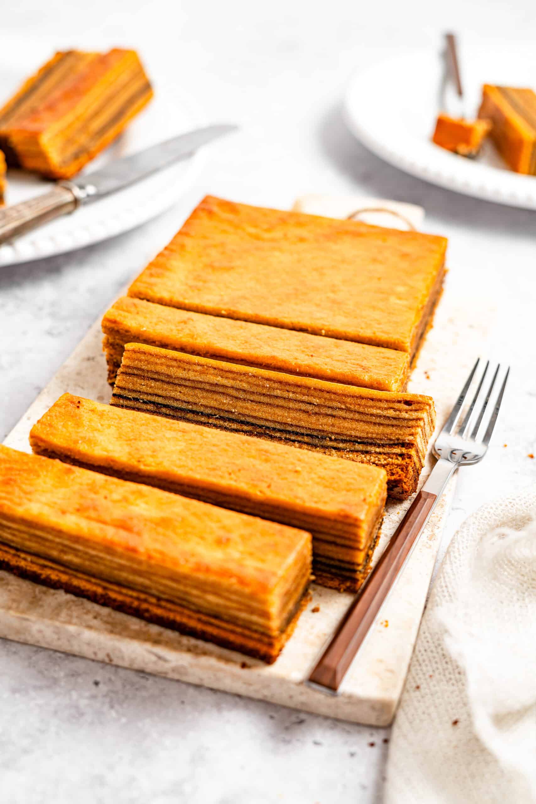 Plated lapis legit slices with a fork - Catherine Zhang Plated lapis legit slices with a fork