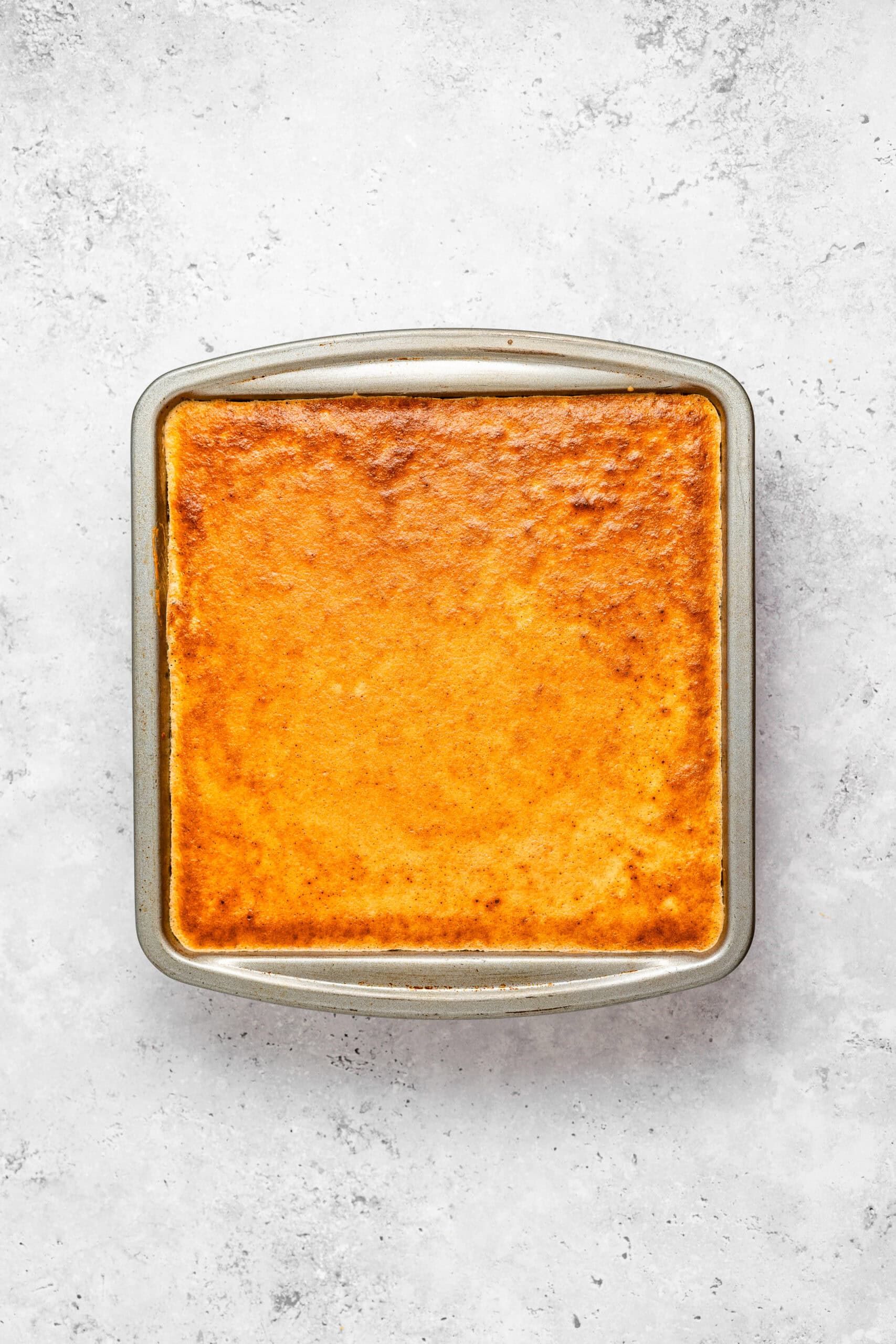 The finished lapis legit baking golden in the pan - Catherine Zhang The finished lapis legit baking golden in the pan