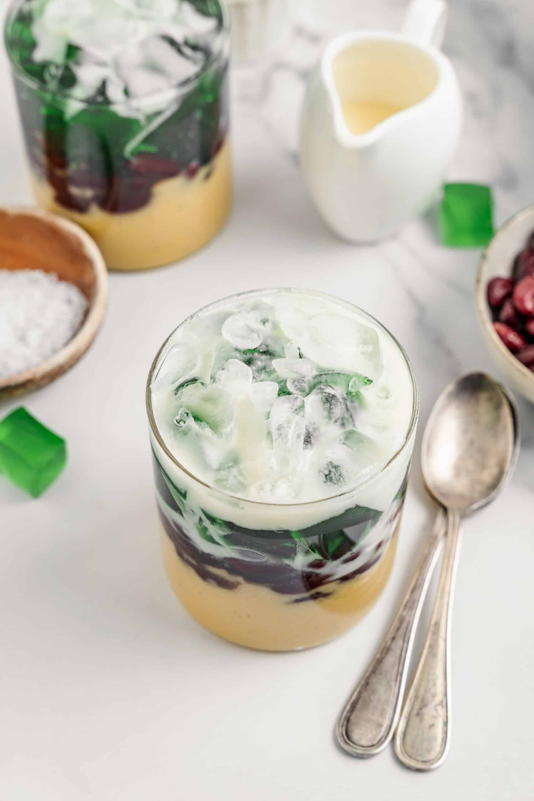 Styled shot of che ba mau, the Vietnamese three color dessert, ready to serve - Catherine Zhang Styled shot of che ba mau, the Vietnamese three color dessert, ready to serve with spoons