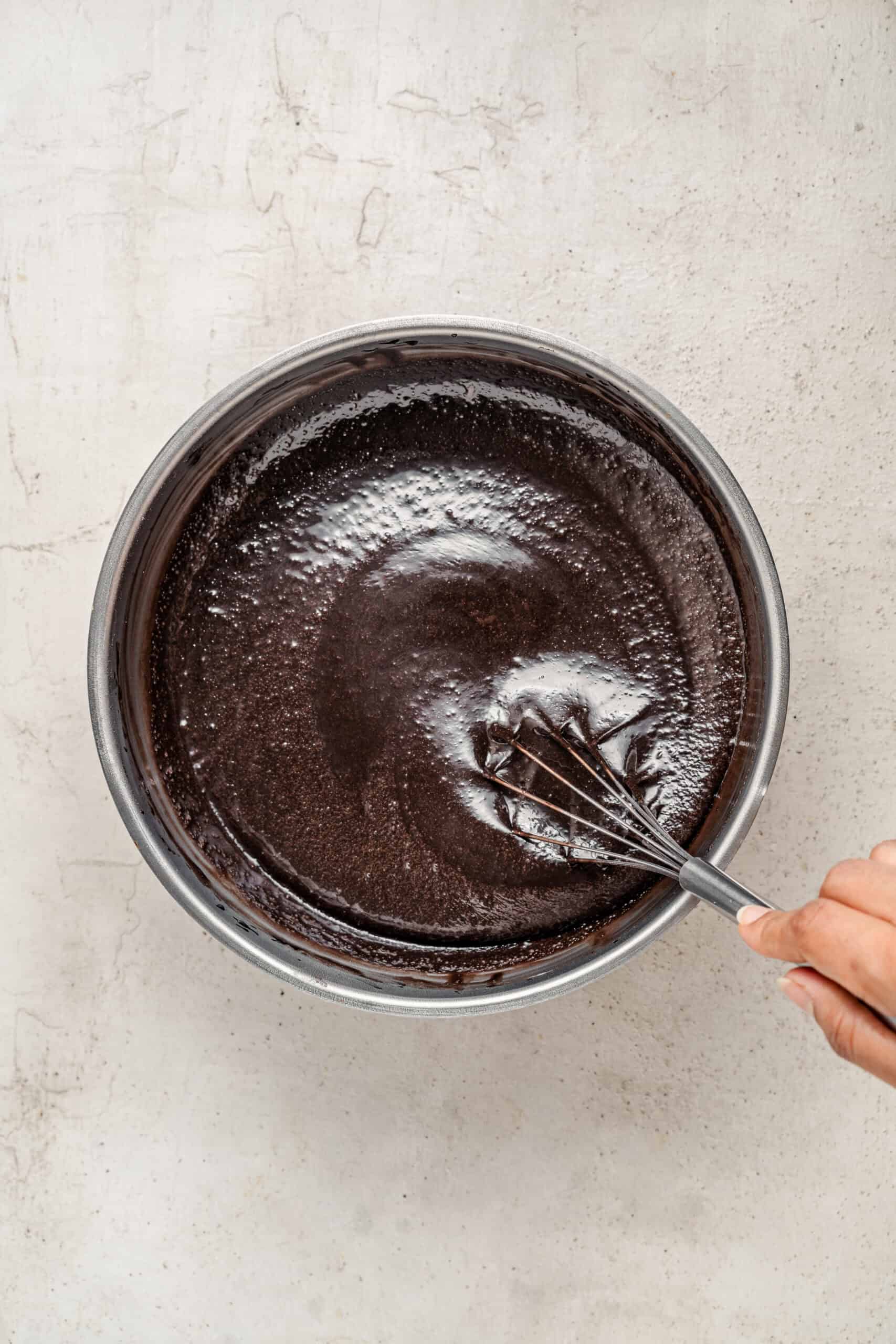 Thin chocolate cake batter after stirring in hot coffee - Catherine Zhang Thin chocolate cake batter after stirring in hot coffee